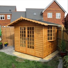 8x6 Shire Gold Fleur De Lys Summerhouse - in situ, angle view