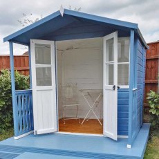 Shire Houghton Summerhouse - painted blue and displayed on decking