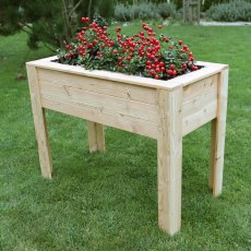 Shire Stef Larchwood Planter - in situ, angle view, berries