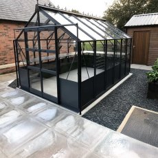 Elite Titan 800 8x12 Greenhouse angled view in graphite with optional hybrid panels - side