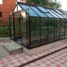 Elite Titan 800 8x18 Greenhouse in brown side angle and elevated